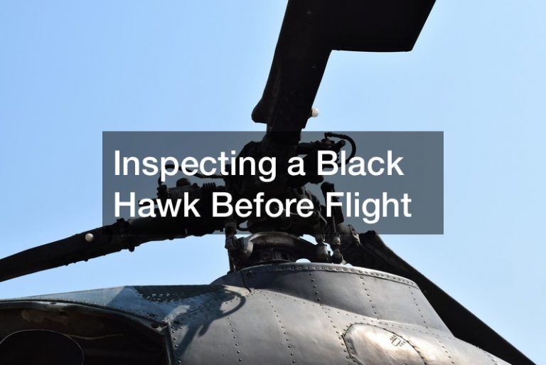 Inspecting a Black Hawk Before Flight